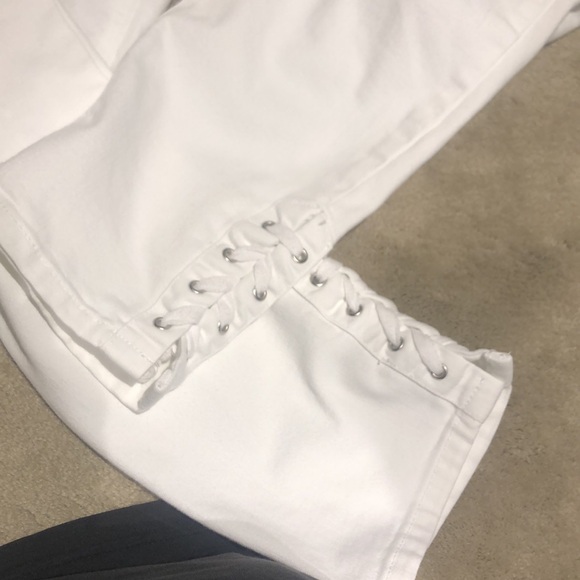 Denim - Cute summer white jeans with lace up, rivets at the hem.  Size 10